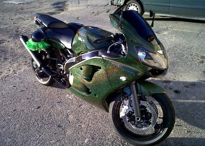 Green Holographic on a super bike.