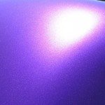 Deep Purple Candy Pearl covered in red Interference Pearl .