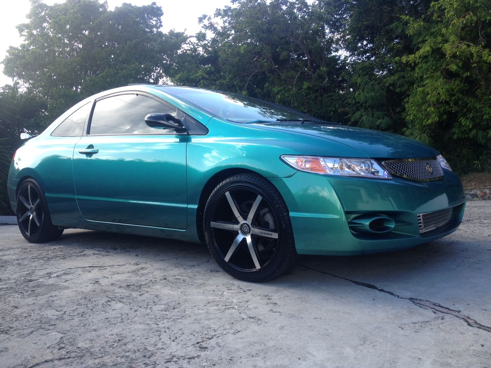 Blue green metallic car paint